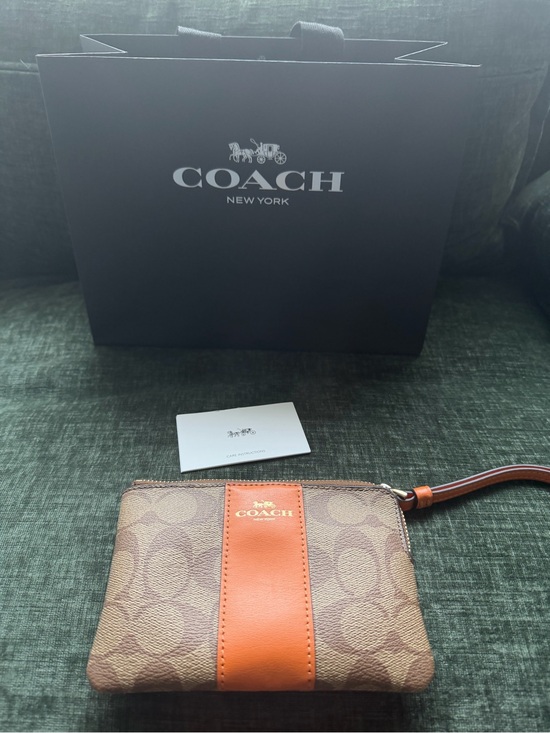 Coach Accessories - Coach Brown Signature Wristlet with Orange Center Stripe